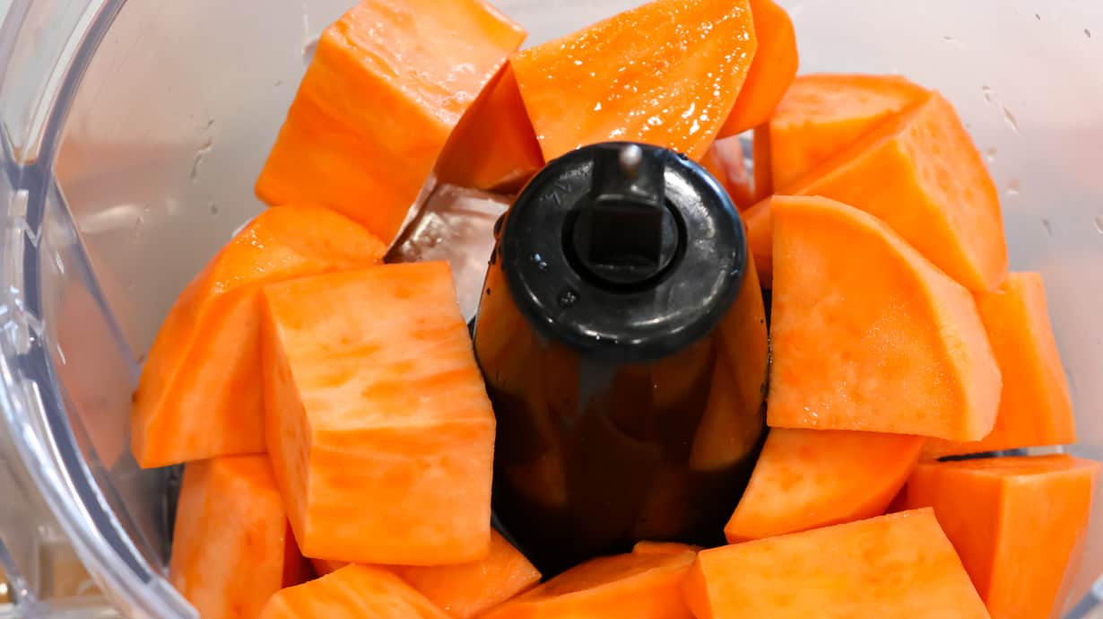 cubed sweet potatoes in food processor