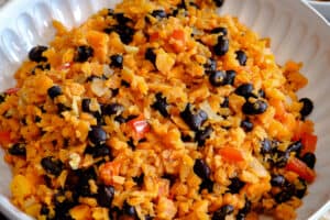 closeup picture of sweet potato rice, onions, and black beans