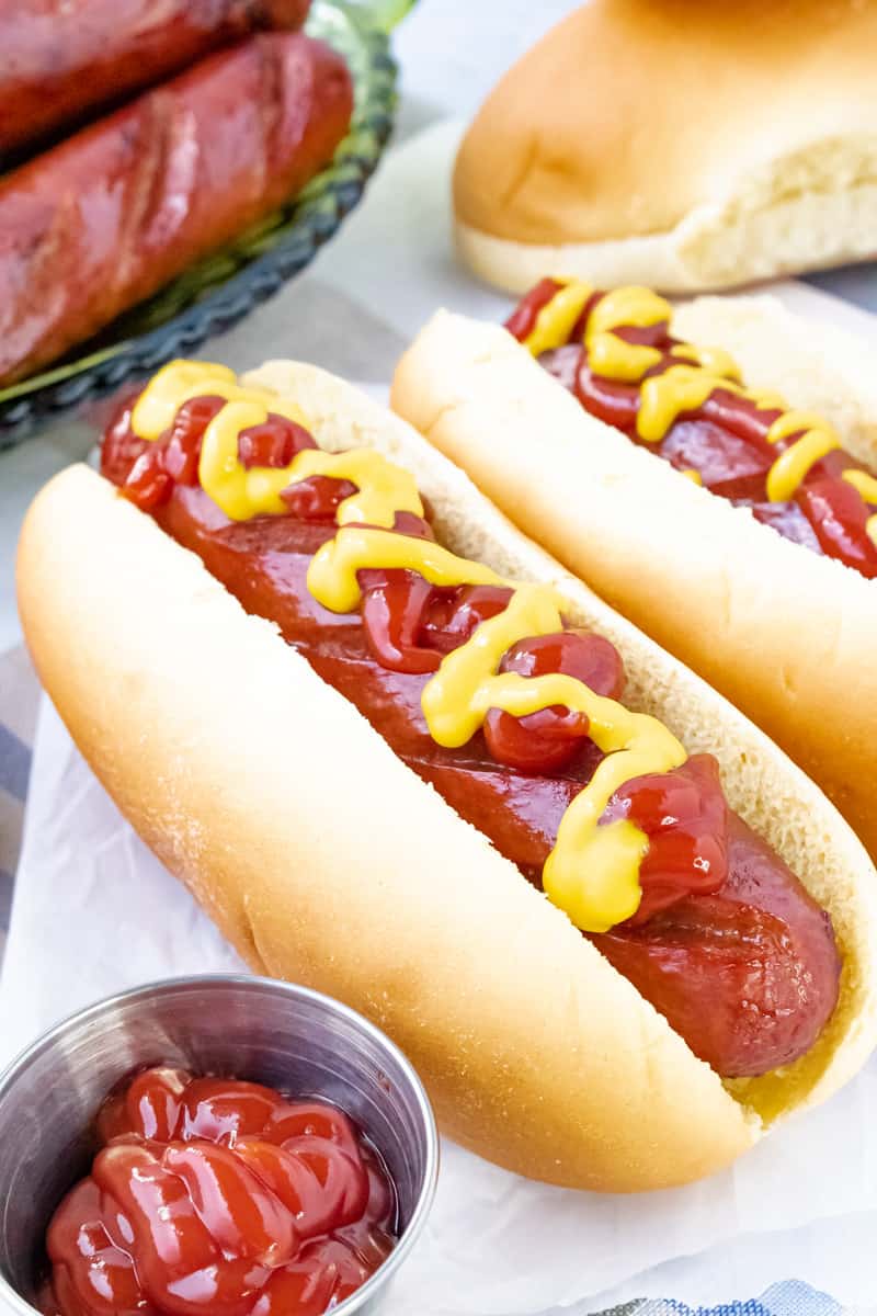 Beef franks topped with mustard and ketchup