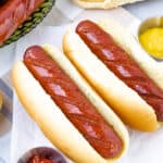 closeup view of two hot dogs in buns
