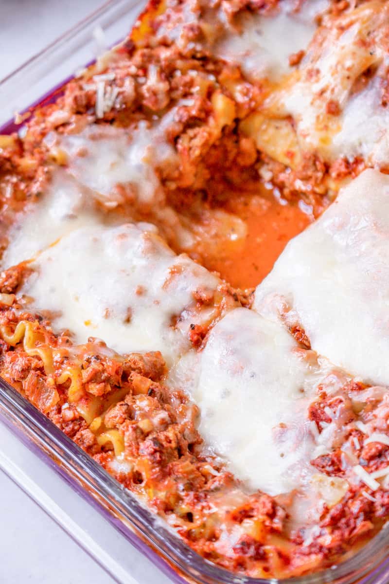 cut out lasagna in baking dish.