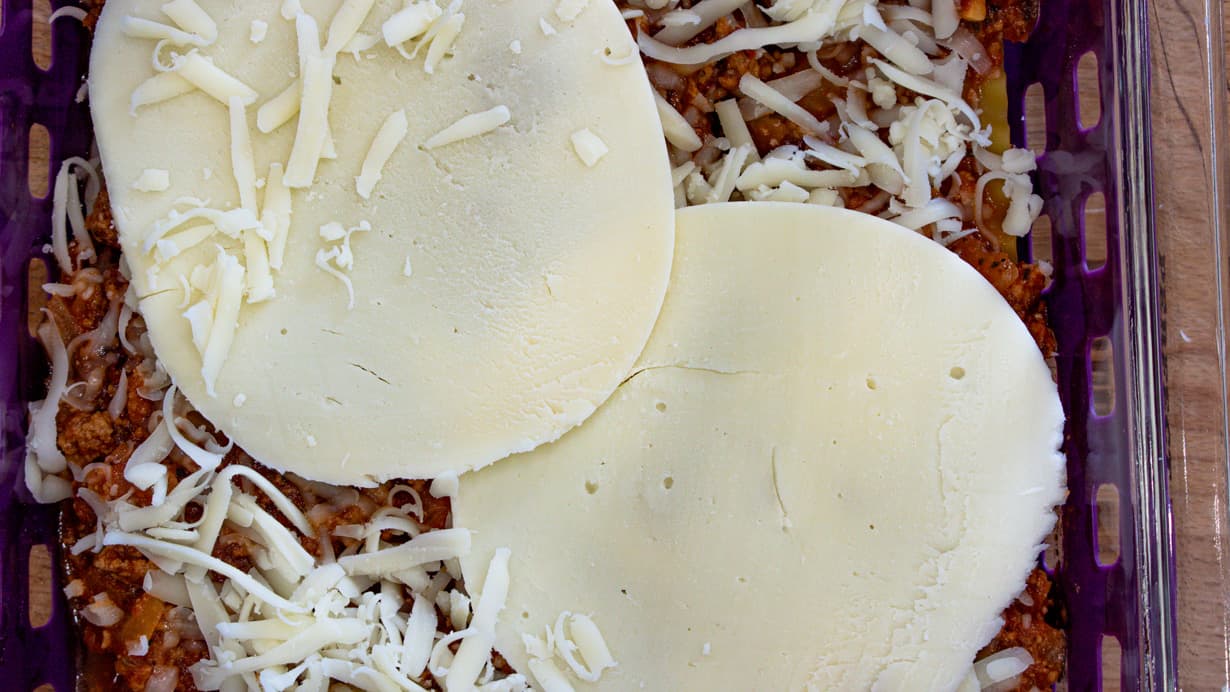 Cheese spread over meat