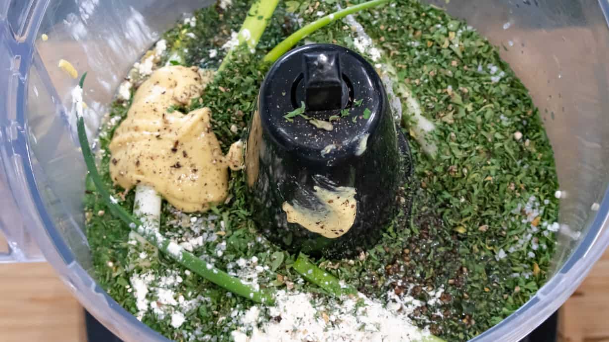 herbs and mustard in food processor