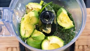 avocado and herbs in food processor