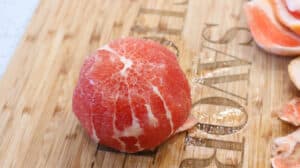Grapefruit on cutting board