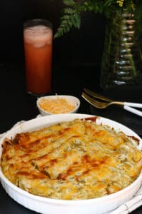 enchiladas in white baking dish