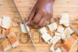 cutting bread on board