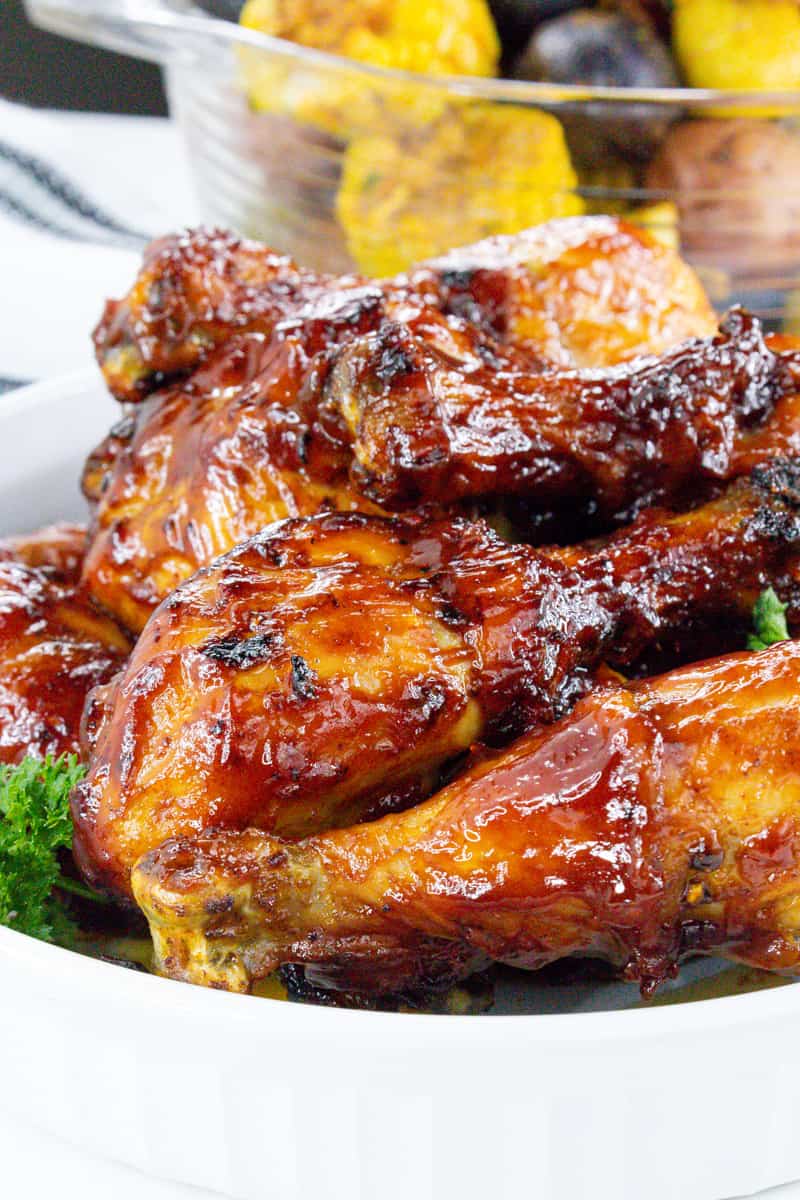 closeup view of cooked air fryer poultry in white bowl with parsley