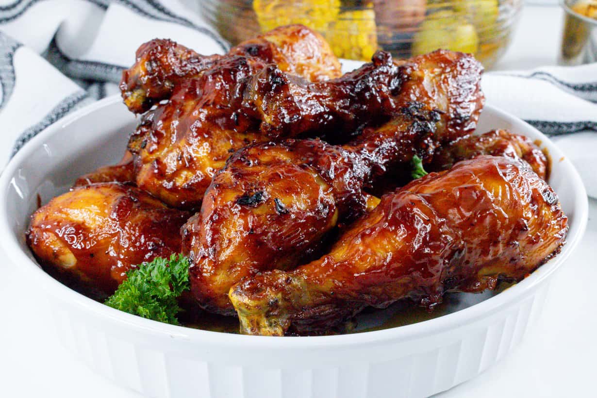 cooked bbq air fryer poultry in white bowl with parsley