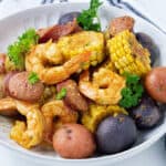 instant pot shrimp boil in white plate
