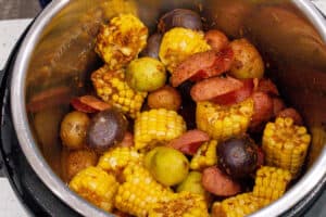 cooked sausage, corn, and potatoes in instant pot