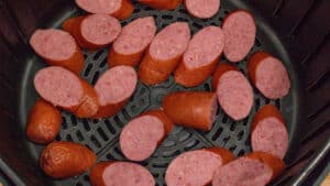 kielbasa sausage slices in air fryer basket