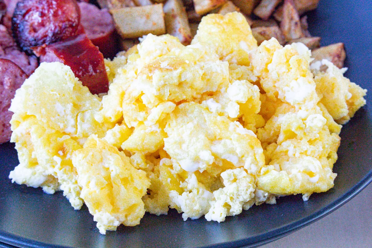 closeup view of scrambled eggs in air fryer