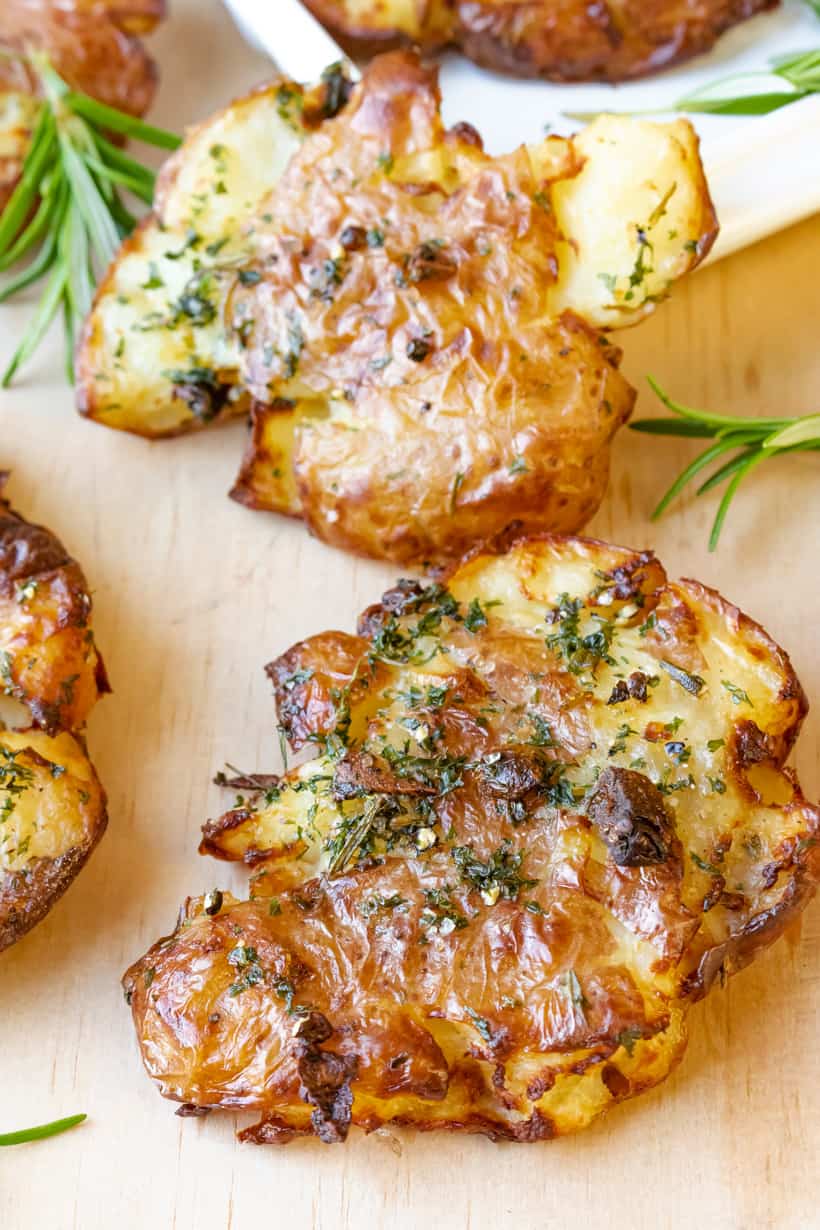 potatoes on board with rosemary