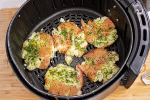 seasoned par boiled potatoes in air fryer basket
