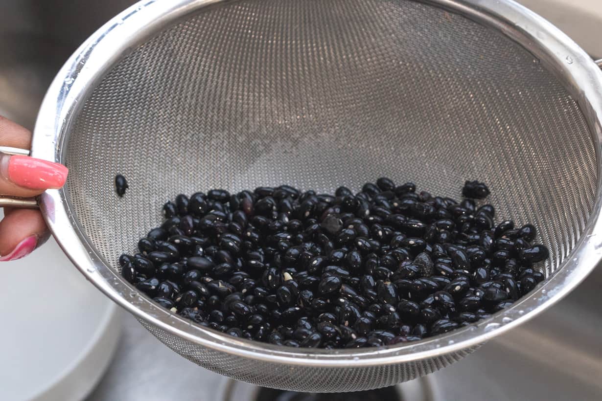 black beans in sieve