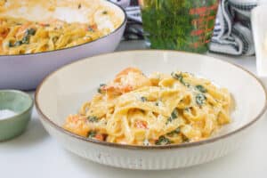 shrimp and spinach Alfredo on plate