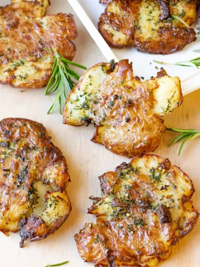 potatoes on board with rosemary