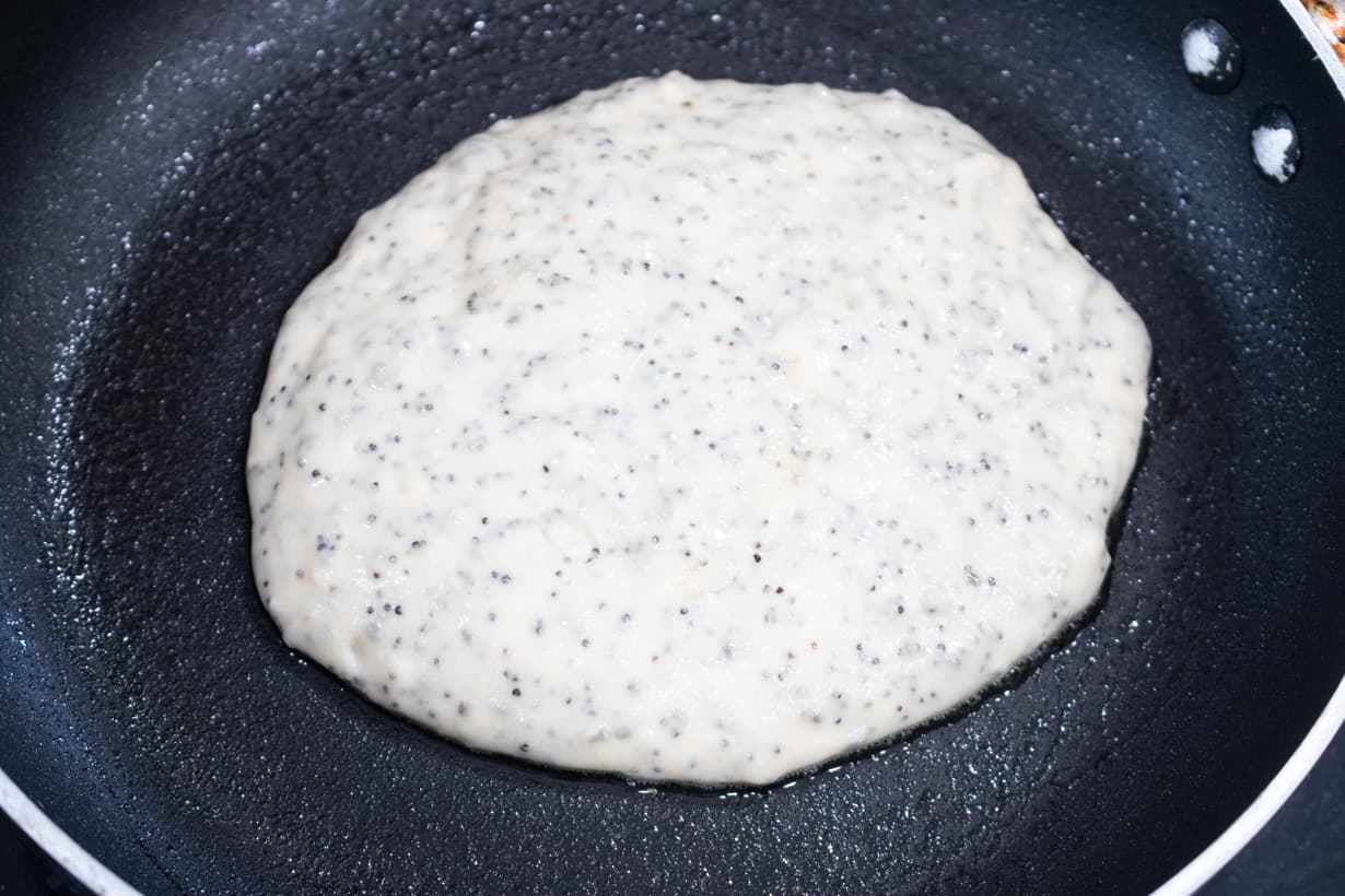 pancake batter in skillet