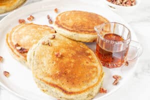pancakes and syrup on plate