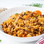rice and pigeon pease in white bowl