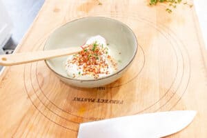 Yogurt and ingredients in a small bowl
