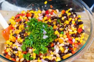 cilantro on top of bans and corn