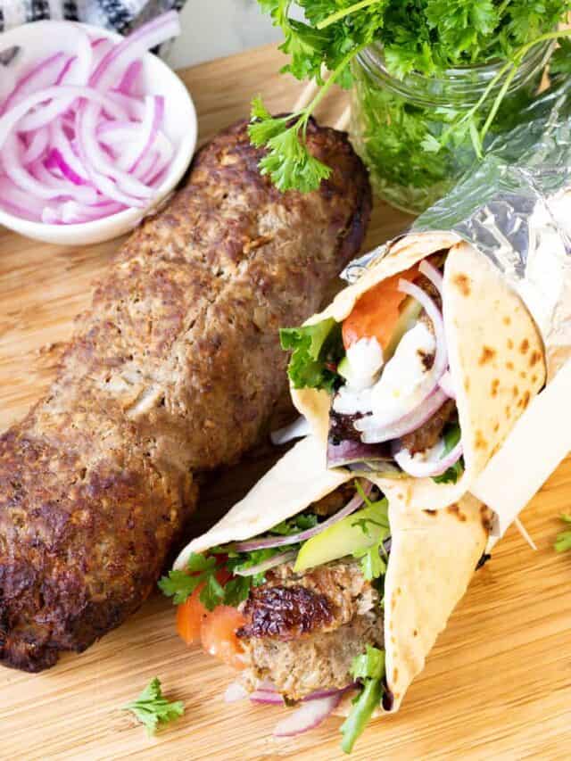 doner kebab and wraps on wooden board