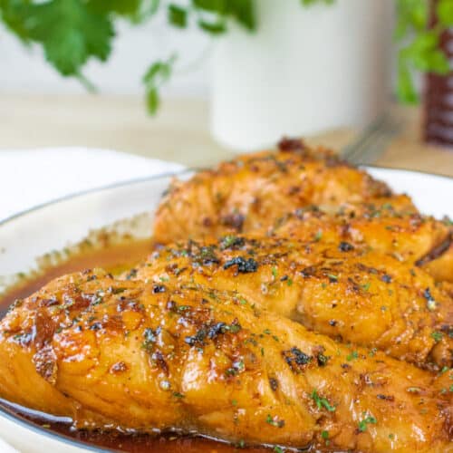 salmon with fresh parsley in the back