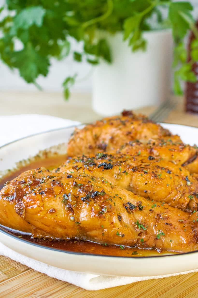 salmon with fresh parsley in the back