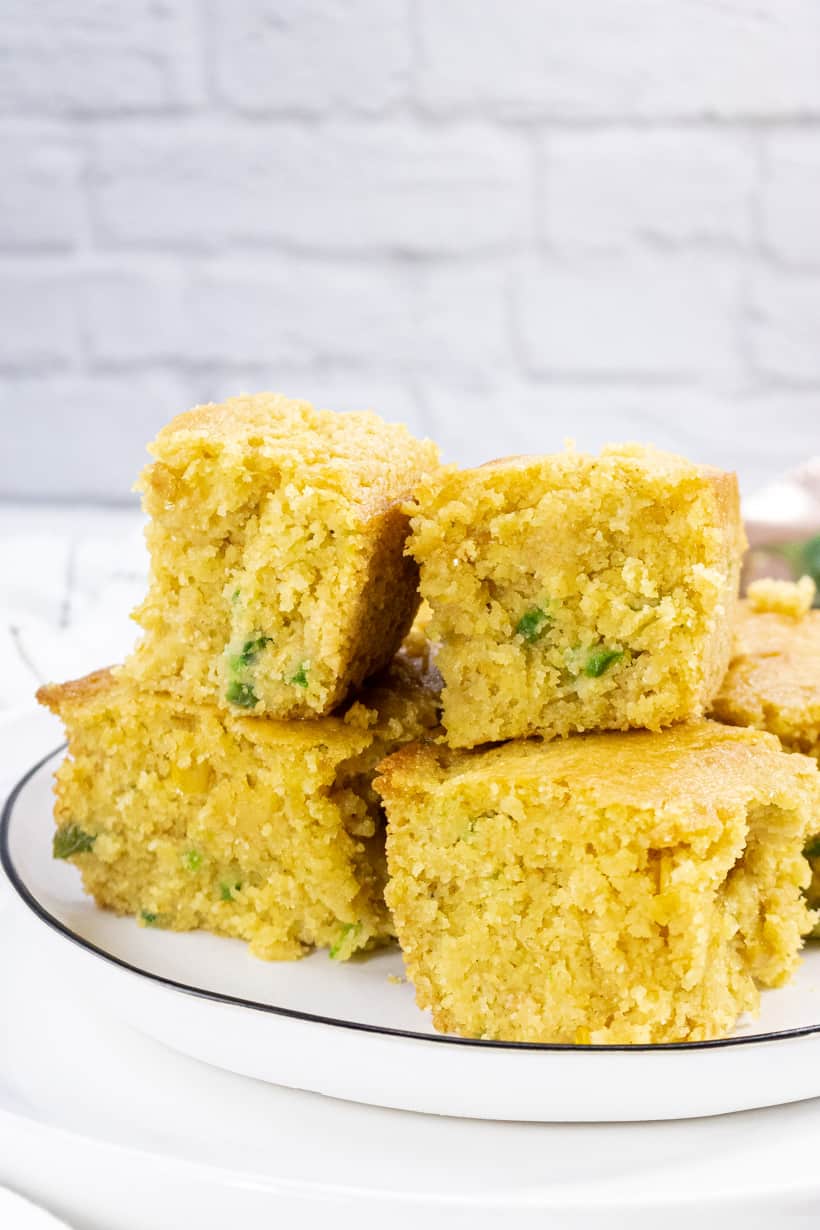cornbread stacked up on white plate