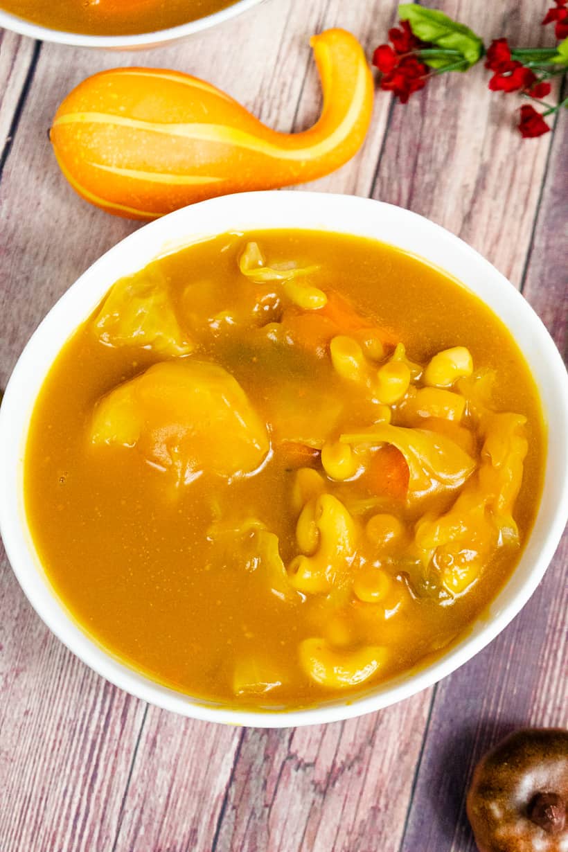 Soup joumou (haitian Pumpkin Soup) in white bowl