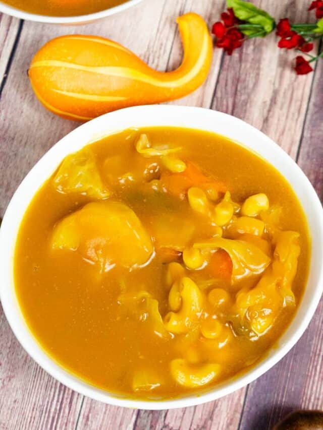 Soup joumou (haitian Pumpkin Soup) in white bowl