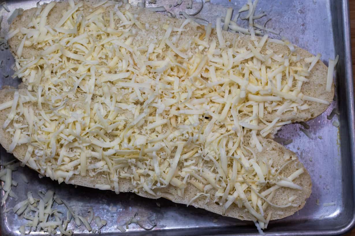 grated cheese on top of bread