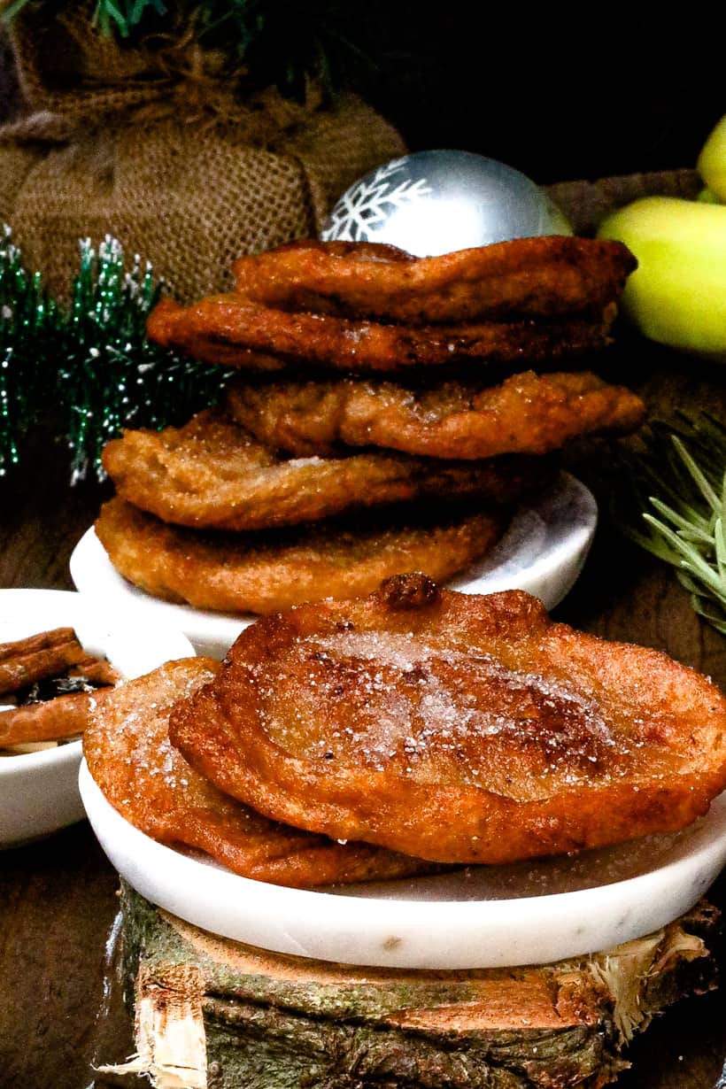 two beignets on top of each other stacked up