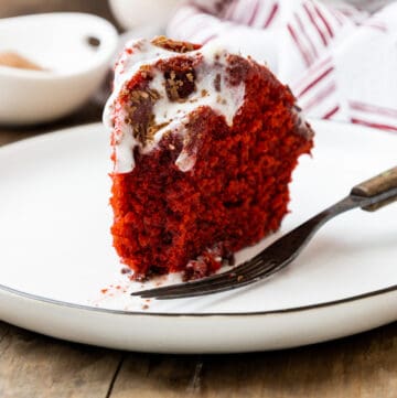 Piece of cake on white plate