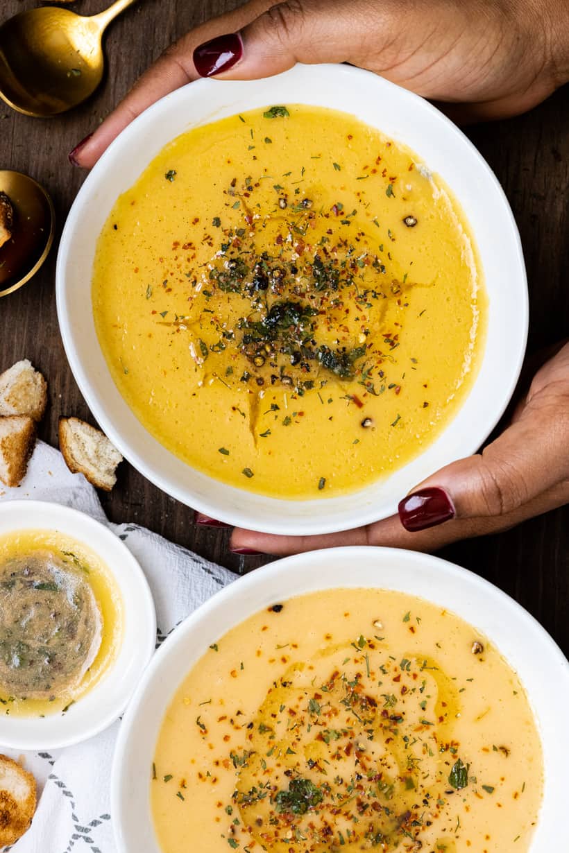 hand holding Turkish lentil soup