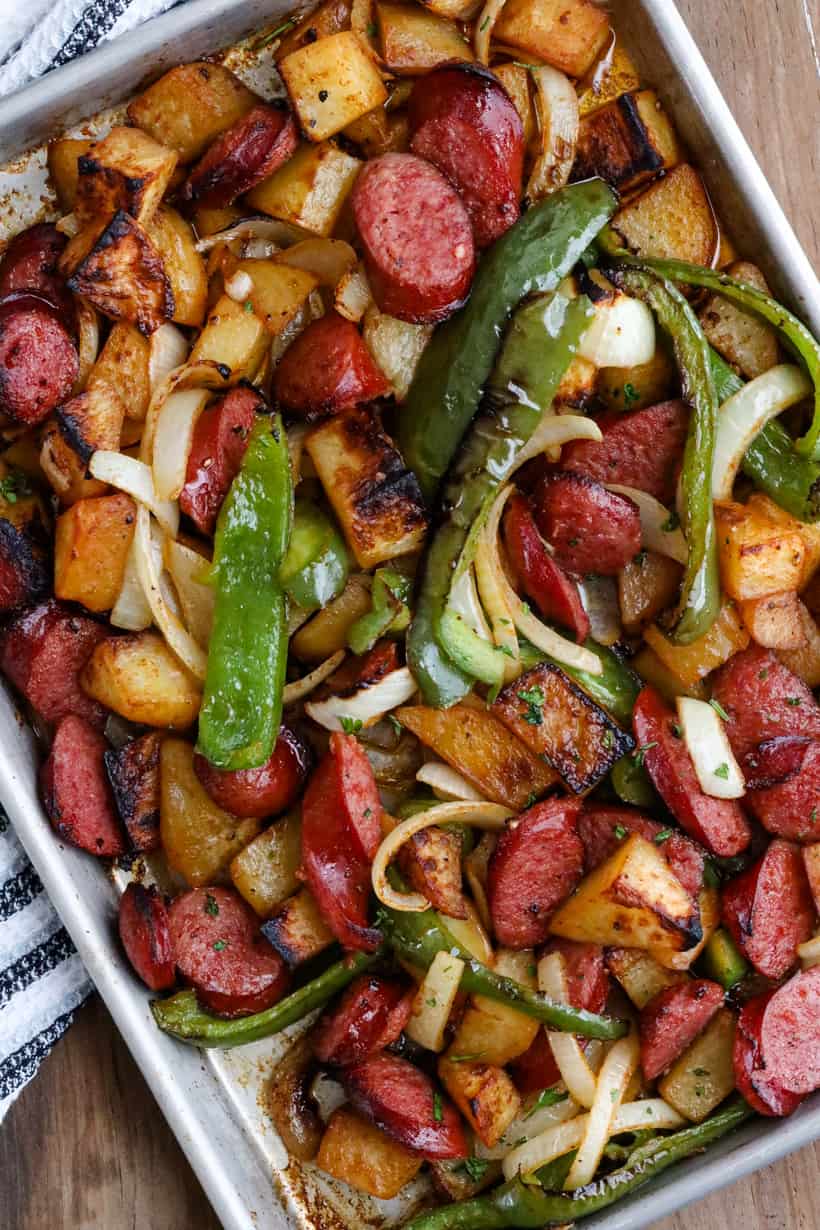 air fryer sausage and potatoes in tray