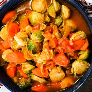 Brussels Sprouts And Carrots Stew in blue bowl