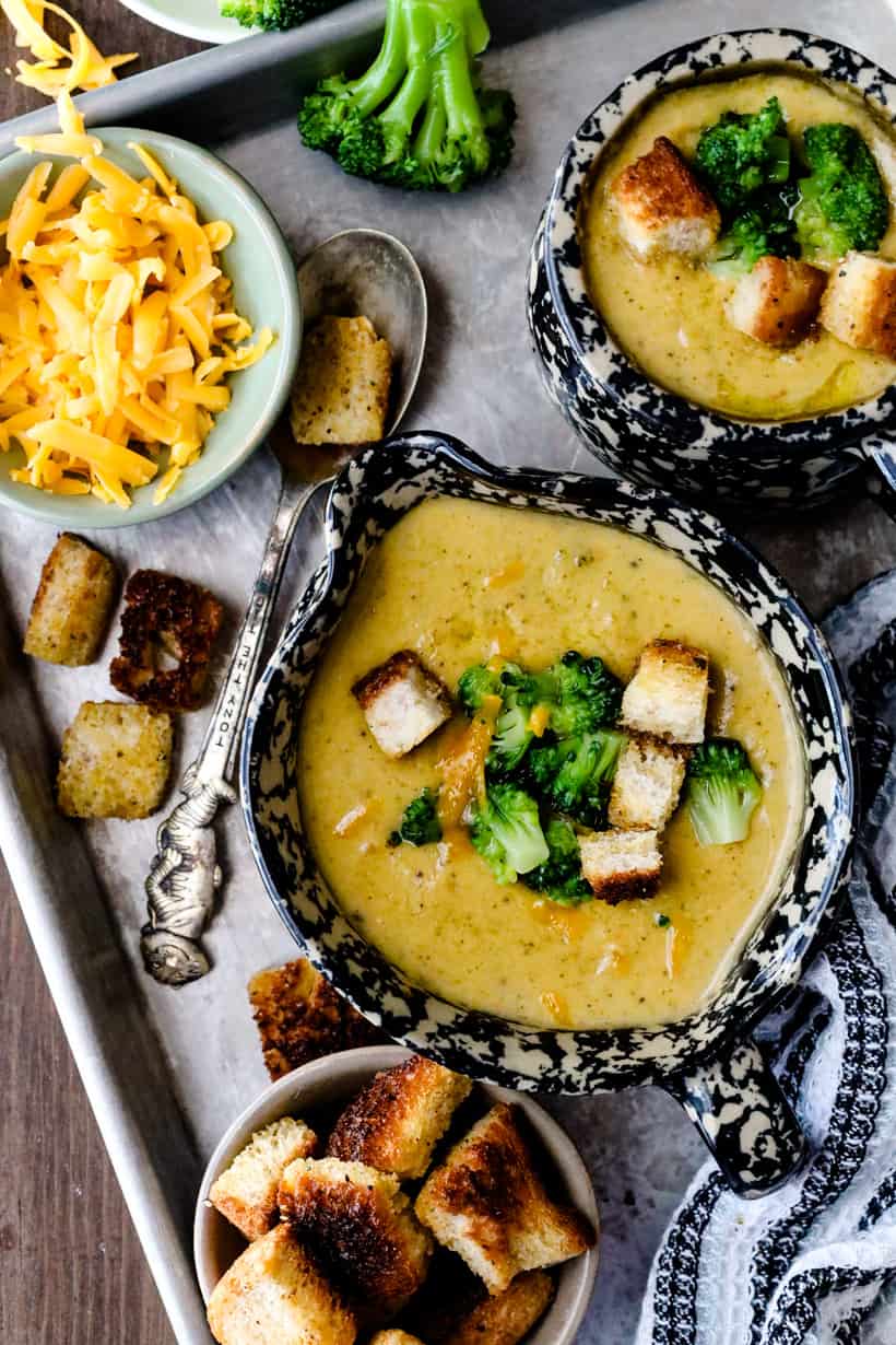 soup in bowls in tray with bread