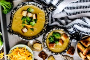 soup in bowl topped with bread and broccoli