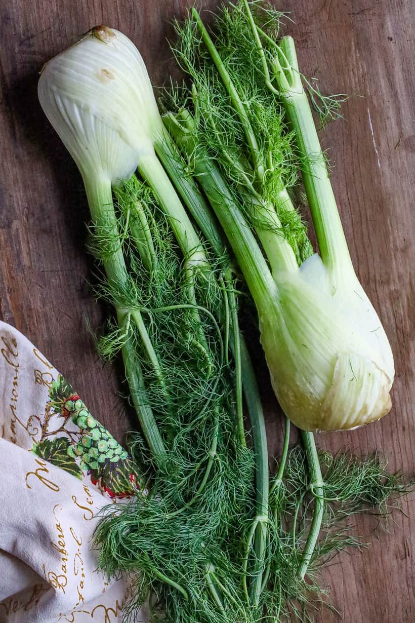 two fennel on wooden board