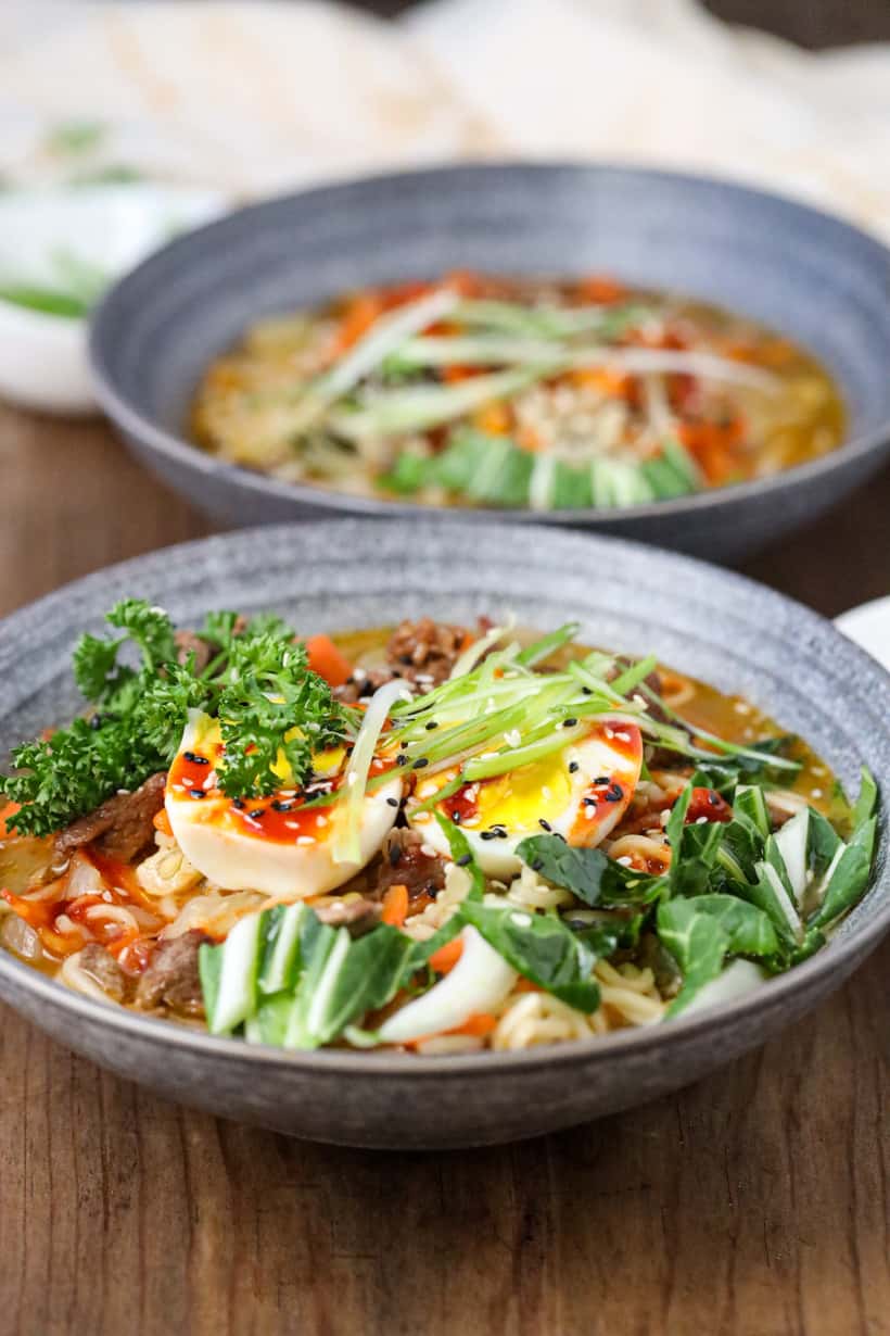 beef ramen soup in two bowls