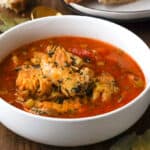 bouillabaisse in white bowl