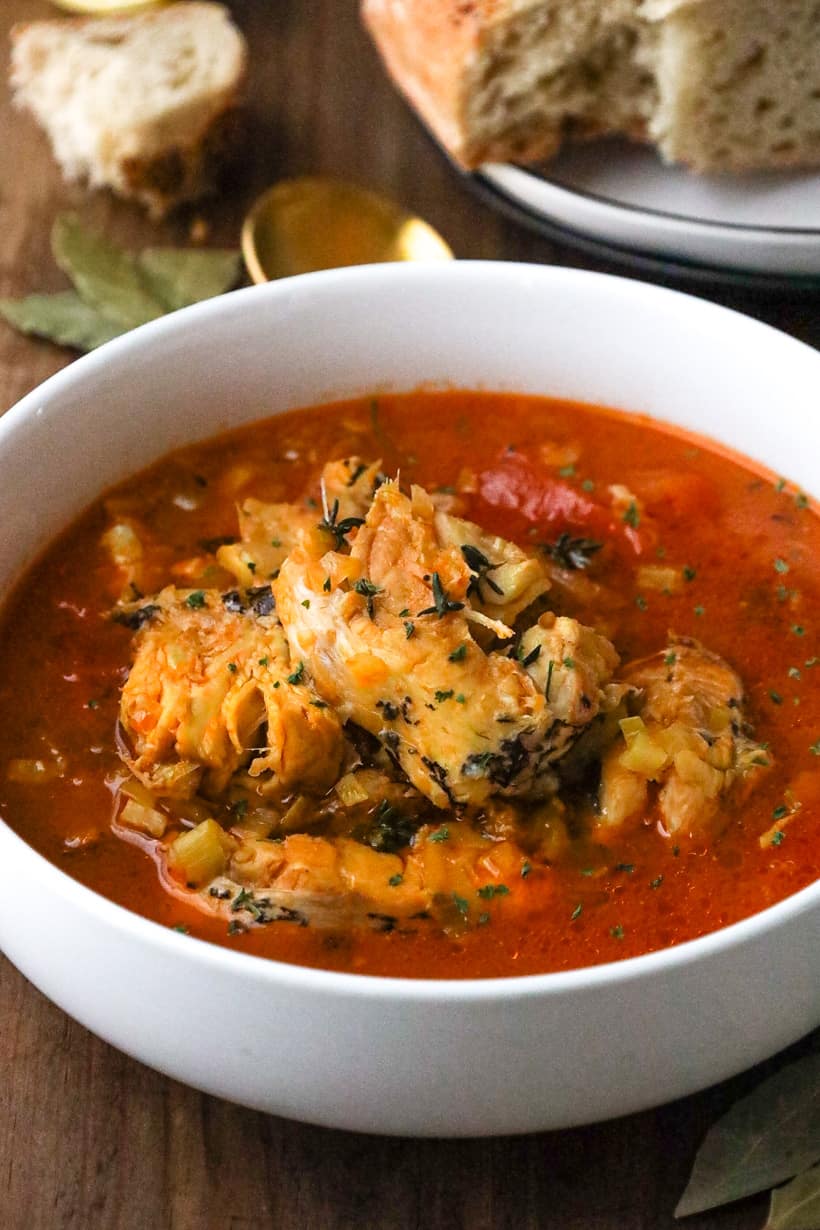 fish stew in white bowl