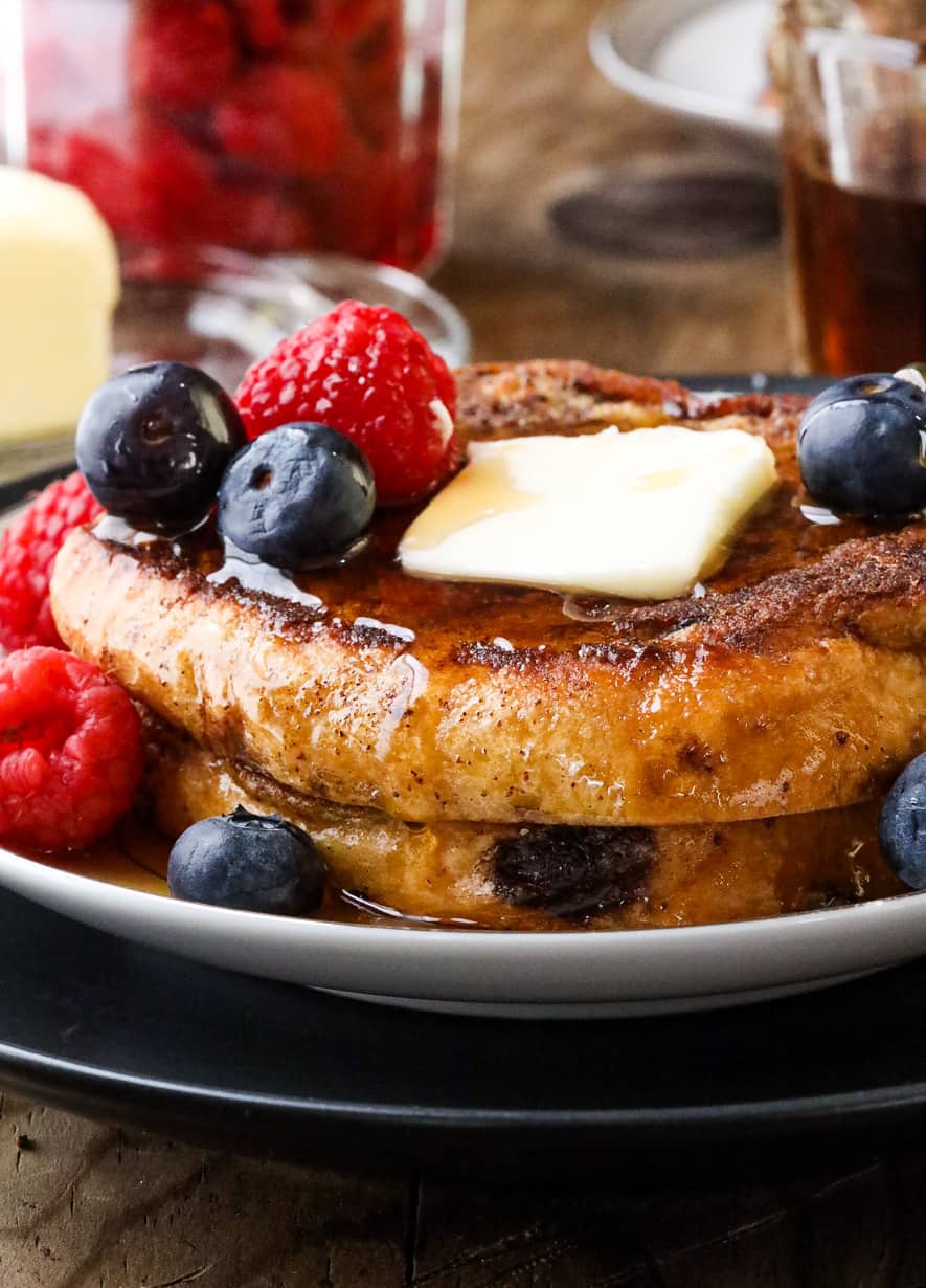 fruits and butter on top of brioche French toast