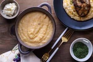 Cheesy grits in brown bowl