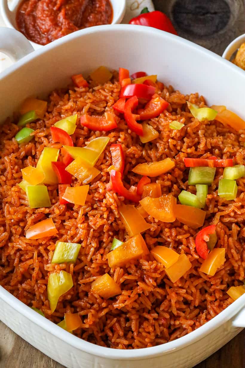 rice topped with bell peppers in bowl