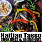 Steak bites on wooden board with herbs and peppers
