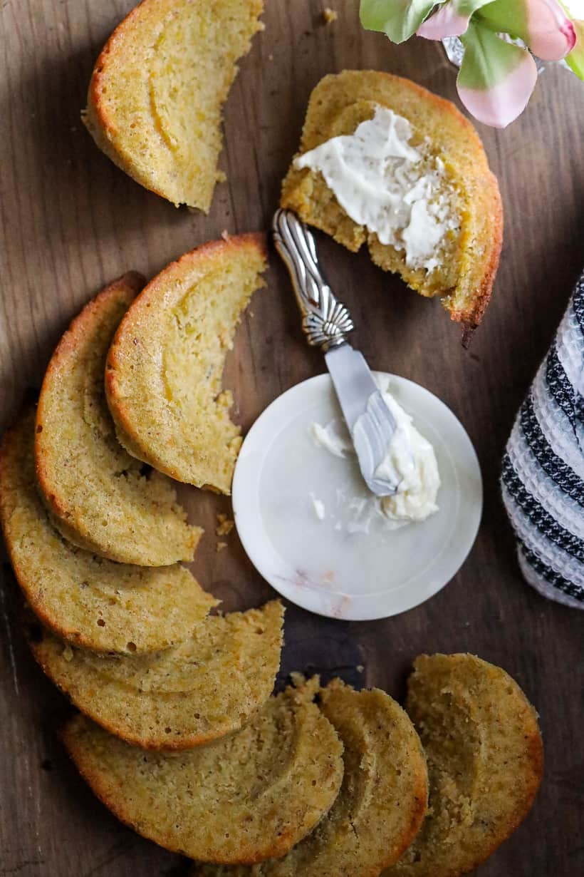 sliced plantain bread on wooden board